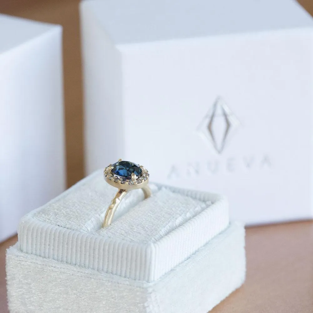 1.32ct Royal Blue Oval Sapphire Halo Ring - Evergreen Carved Band in a Satin Finish 14k Yellow Gold