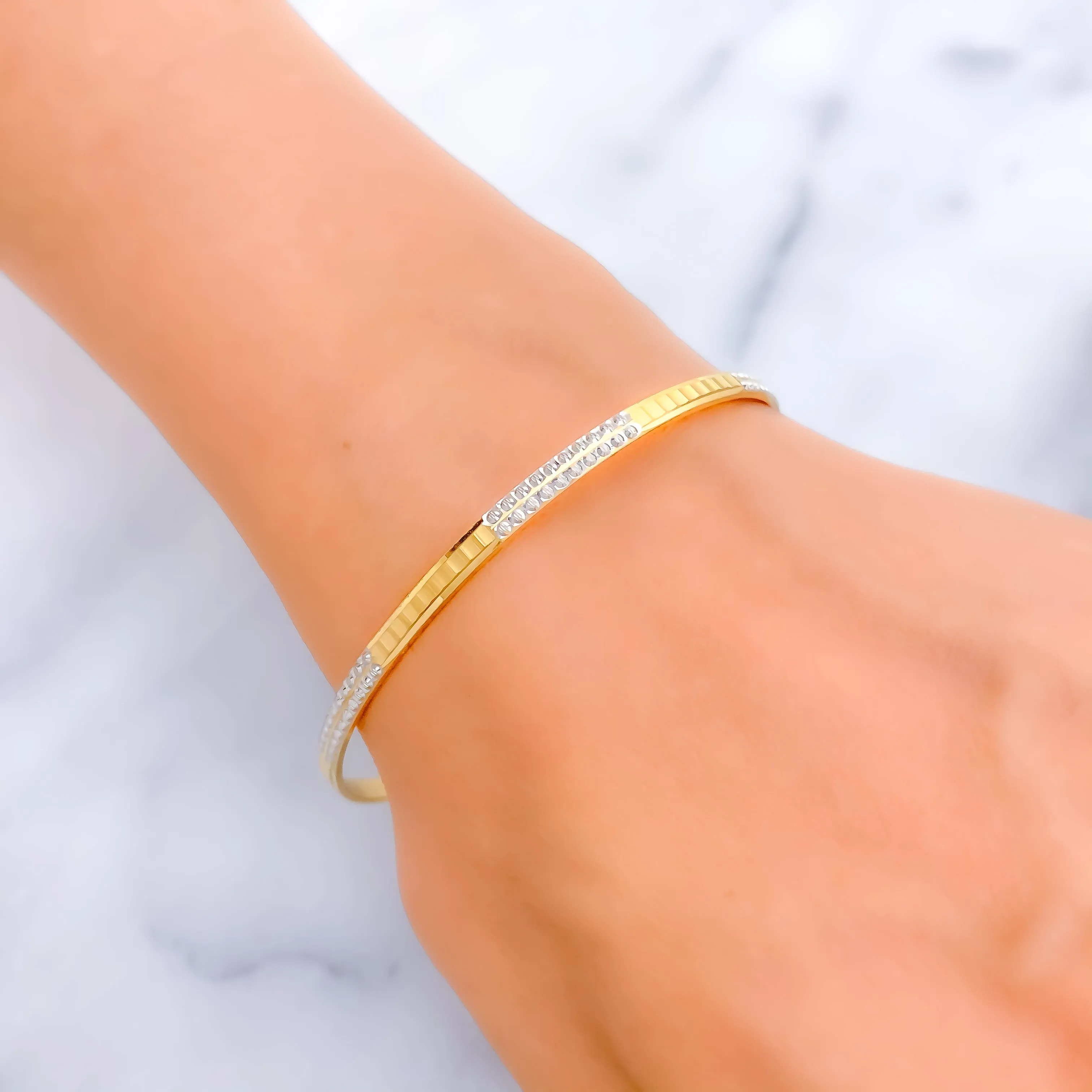 Alternating Glistening Two-Tone 22k Gold Bangle