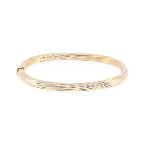 ESTATE 14K YELLOW GOLD OVAL TWISTED RIBBED BANGLE BRACELET